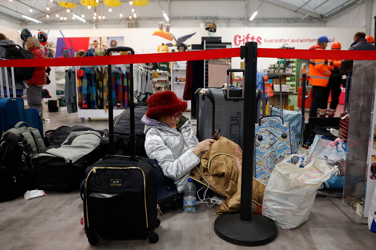 <i>Clodagh Kilcoyne/Reuters via CNN Newsource</i><br/>Passengers wait at the Belfast port before boarding the Odyssey on Monday