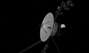 A rendering depicts the Voyager 2 spacecraft