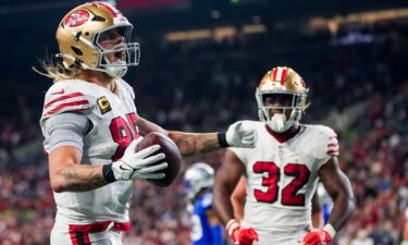 Tight end George Kittle (left) scored a fourth-quarter touchdown as the San Francisco 49ers beat the Seattle Seahawks on Thursday Night Football.