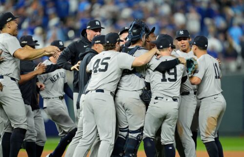 The New York Yankees celebrate the win over the Kansas City Royals in game four of the ALDS at Kauffman Stadium.