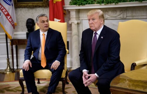 Hungary's Prime Minister Viktor Orban and US President Donald Trump wait for a meeting in the Oval Office of the White House May 13