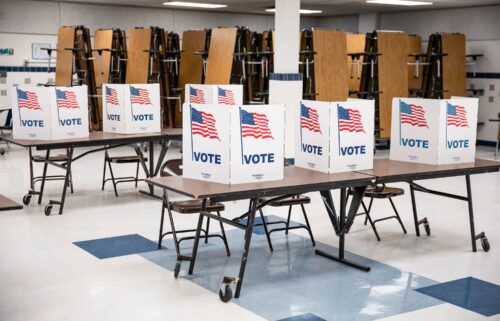 Voting booths sit empty at a polling location in Arlington