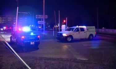 Police work at the scene of a shooting at a party in Oklahoma City on Saturday