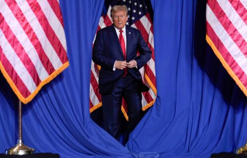 Former President Donald Trump arrives for a campaign event in Erie