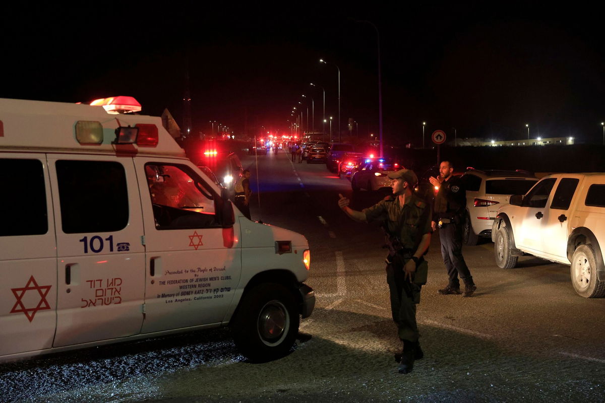 <i>Amir Levy/Getty Images via CNN Newsource</i><br/>Emergency services personnel attend the scene of a drone strike on October 13 in Binyamina