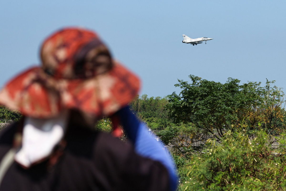 <i>I-Hwa Cheng/AFP/Getty Images via CNN Newsource</i><br/>A Taiwanese Air Force Mirage 2000 fighter jet prepares to land at an air force base in Hsinchu