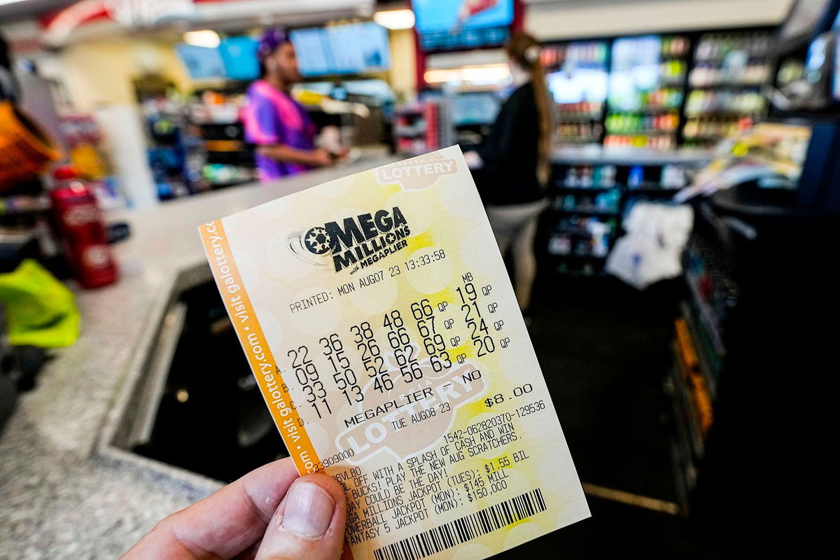 <i>Mike Stewart/AP via CNN Newsource</i><br/>A Mega Millions ticket will cost $5 next year.