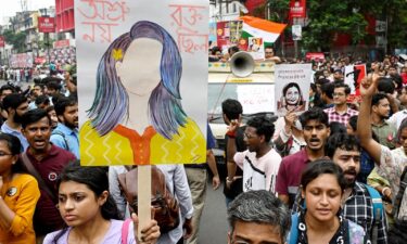 Doctors and social activists march during a rally to condemn the rape and murder of a doctor in Kolkata on October 2.