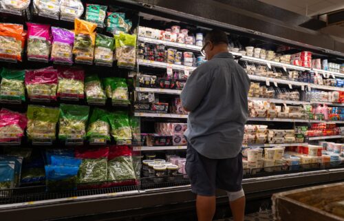 A customer shops at a store in Brooklyn on August 14