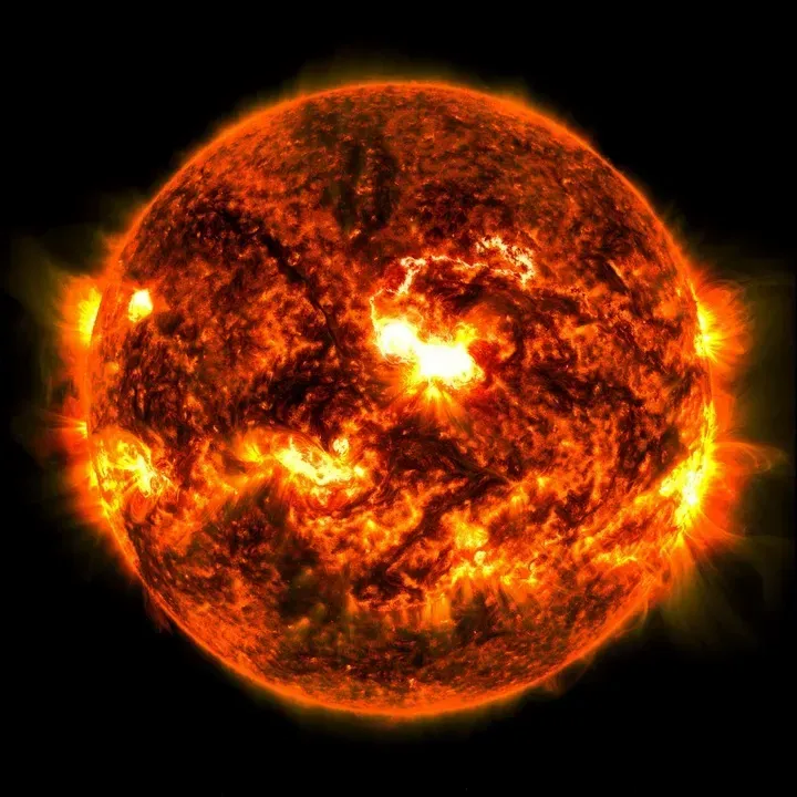 <i>SDO/NASA via CNN Newsource</i><br/>NASA’s Solar Dynamics Observatory captured this image of a solar flare — seen as the bright flash in the center of the sun’s disk — on October 8.