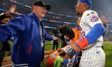 New York Mets owner Steve Cohen celebrates with shortstop Francisco Lindor after defeating the Philadelphia Phillies in game four of the NLDS.