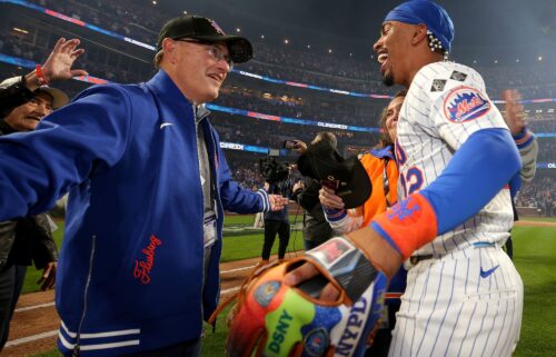 New York Mets owner Steve Cohen celebrates with shortstop Francisco Lindor after defeating the Philadelphia Phillies in game four of the NLDS.