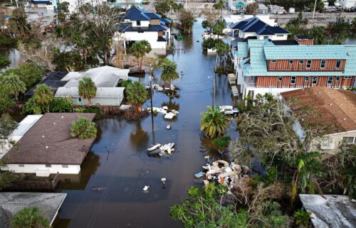 A drone image shows a flooded street due to Hurricane Milton in Siesta Key