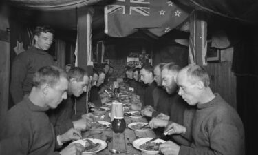 The crew of the Endurance is pictured eating a meal on board