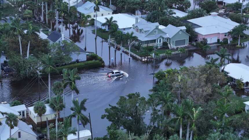 <i>Joe Raedle/Getty Images via CNN Newsource</i><br/>Flood waters inundated a neighborhood after Hurricane Milton came ashore on October 10 in Punta Gorda