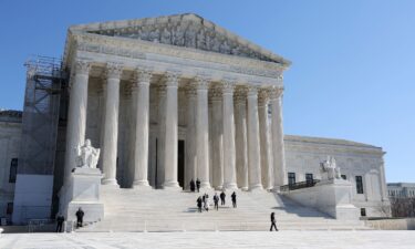 People leave the US Supreme Court on February 21 in Washington