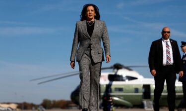 Vice President Kamala Harris walks to board Air Force Two to depart for Michigan