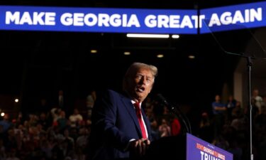 Republican presidential nominee former President Donald Trump speaks at a campaign rally at McCamish Pavilion