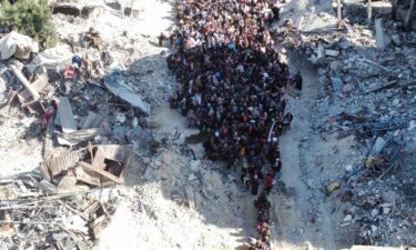 Displaced Palestinians evacuate from Jabalya refugee camp.