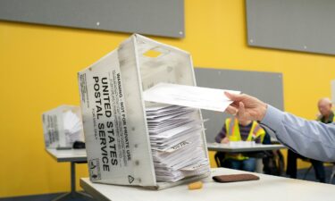 Absentee ballots are prepared to be mailed at the Wake County Board of Elections on September 17 in Raleigh