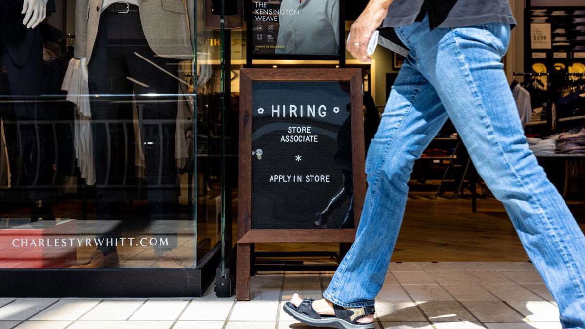 <i>Anna Rose Layden/Getty Images/File via CNN Newsource</i><br/>A hiring sign is displayed in front of a store at the Tysons Corner Center mall in Alexandria