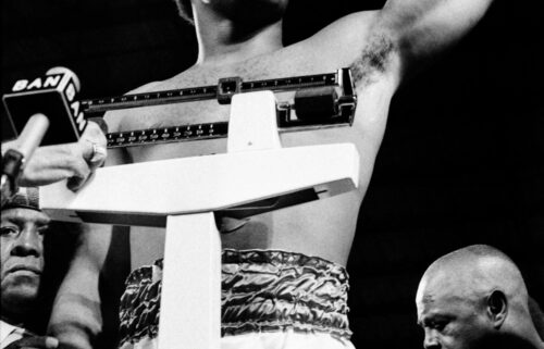 Foreman gestures during the weigh-in on October 29