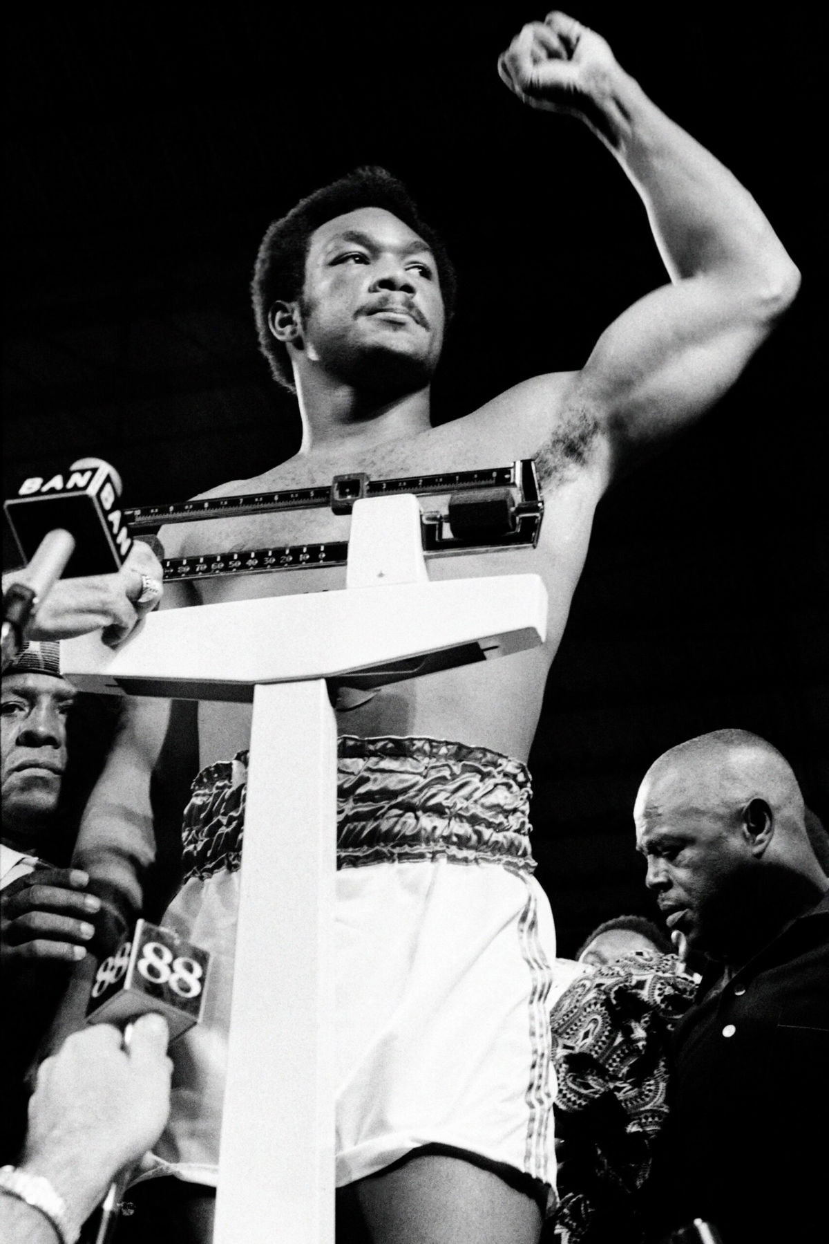 <i>AFP via Getty Images via CNN Newsource</i><br/>Foreman gestures during the weigh-in on October 29