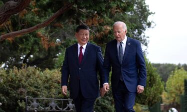 Chinese leader Xi Jinping and US President Joe Biden walk together after a meeting on the sidelines of the Asia-Pacific Economic Cooperation Leaders' week in California last November.