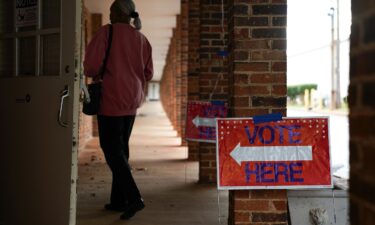 People arrive to cast their votes at a polling location in Atlanta on October 15