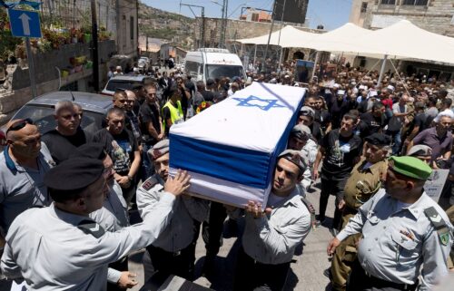 Soldiers carry the coffin of an Israeli Captain who was killed in fighting in southern Gaza