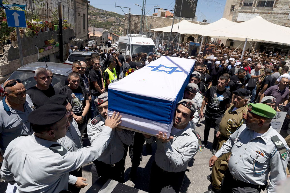 <i>Amir Levy/Getty Images via CNN Newsource</i><br/>Soldiers carry the coffin of an Israeli Captain who was killed in fighting in southern Gaza