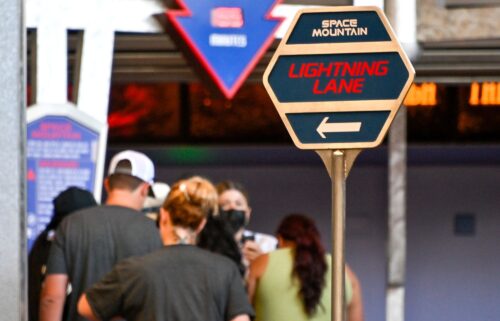 Folks line up in the Lightning Lane at Space Mountain at Disneyland in California in August 2022.