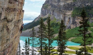 Tommy Caldwell climbing above Lake Louise in Banff National Park in Canada.