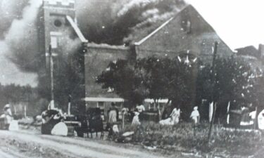 Mt. Zion Baptist Church burns after being torched by White mobs during the 1921 Tulsa race riot.