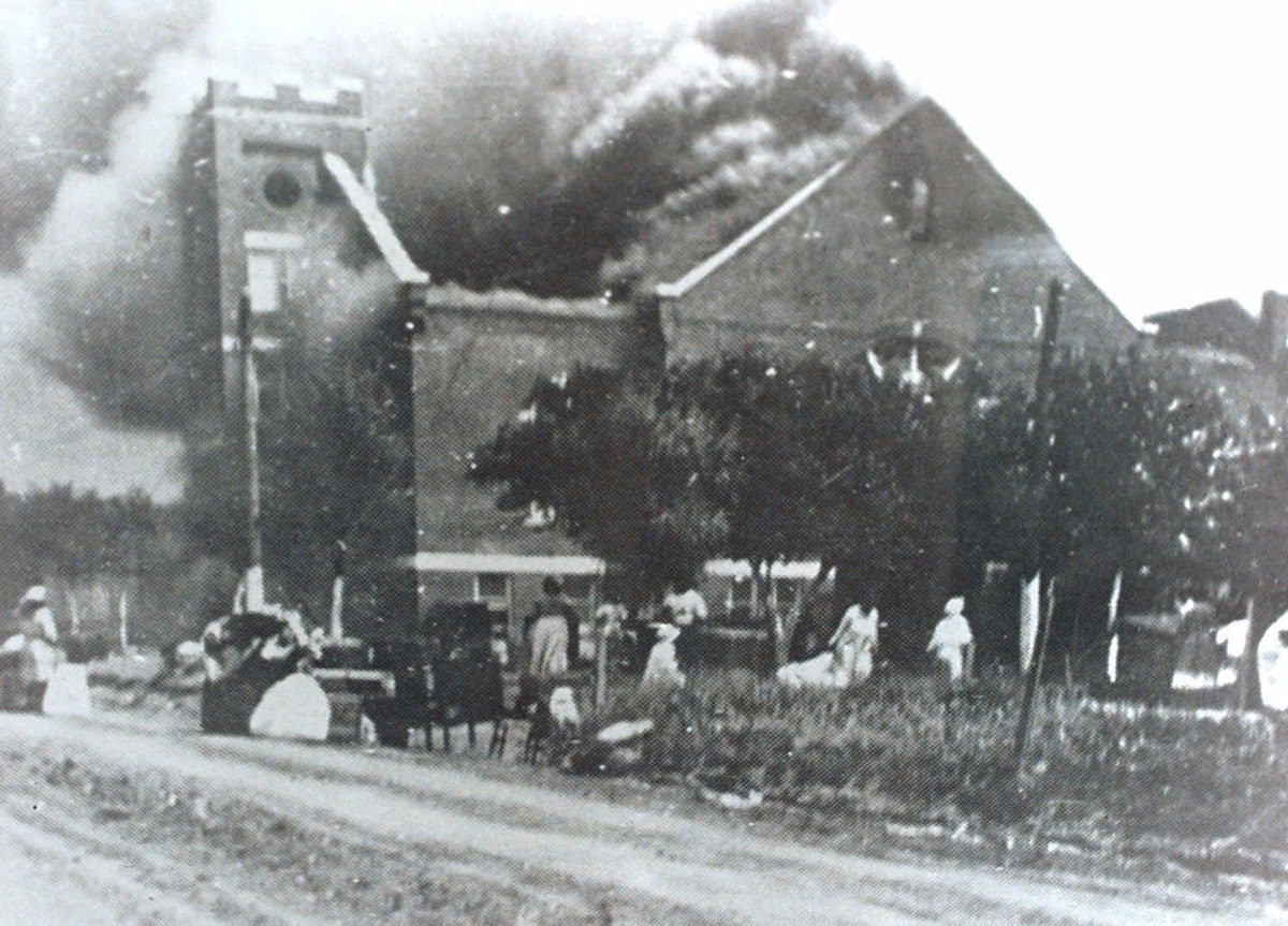 <i>Greenwood Cultural Center/Tulsa World/AP via CNN Newsource</i><br/>Mt. Zion Baptist Church burns after being torched by White mobs during the 1921 Tulsa race riot.