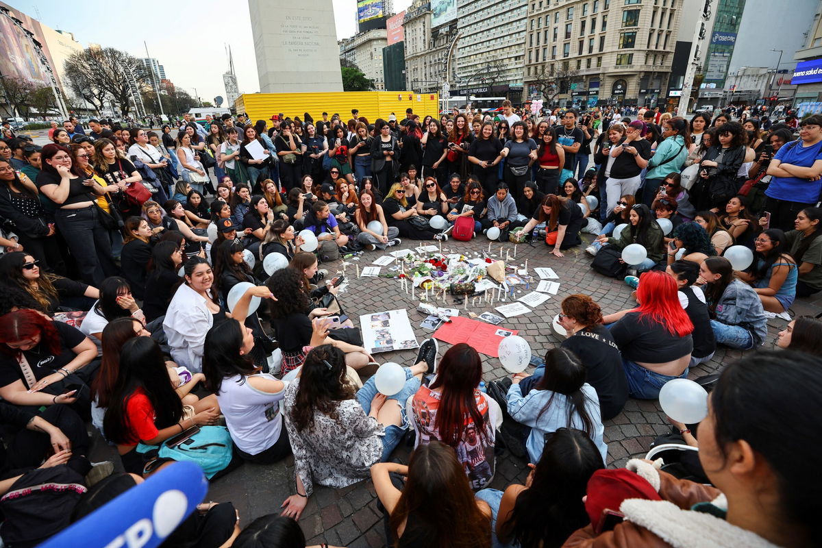 <i>Agustin Marcarian/Reuters via CNN Newsource</i><br/>One Direction fans gather at the Obelisk to pay tribute to Liam Payne in Buenos Aires