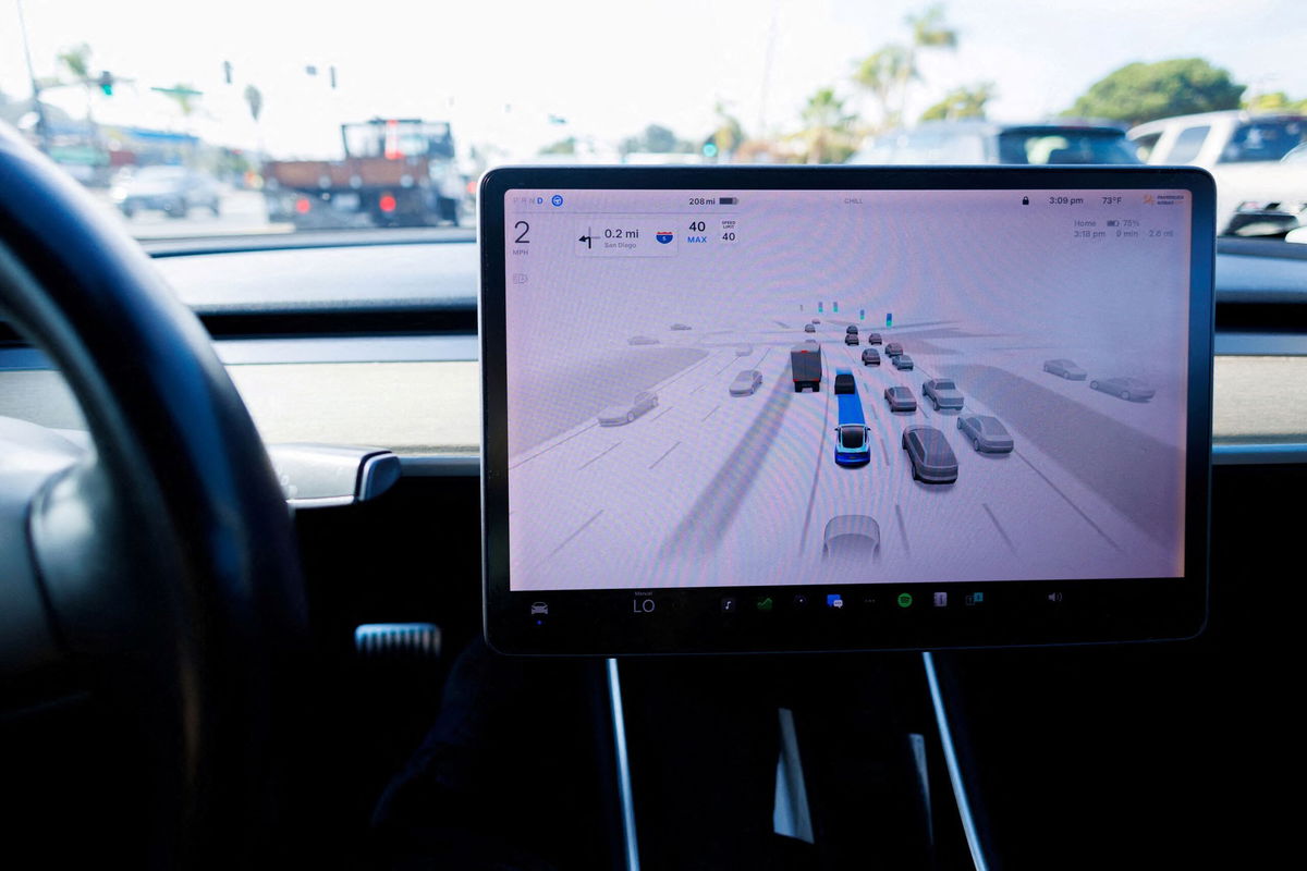 <i>Mike Blake/Reuters via CNN Newsource</i><br/>A Tesla Model 3 vehicle drives using FSD (Full Self-Driving) in Encinitas