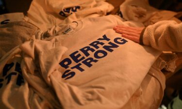 T-shirts reading "Perry Strong" were available at a vigil following a shooting at Perry High School in Perry