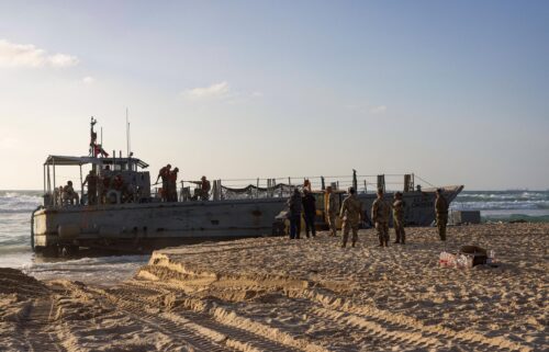 US soldiers stand next to one of two US Army vessels that ran aground in Israel's coastal city of Ashdod on May 25. The US military said four of its vessels