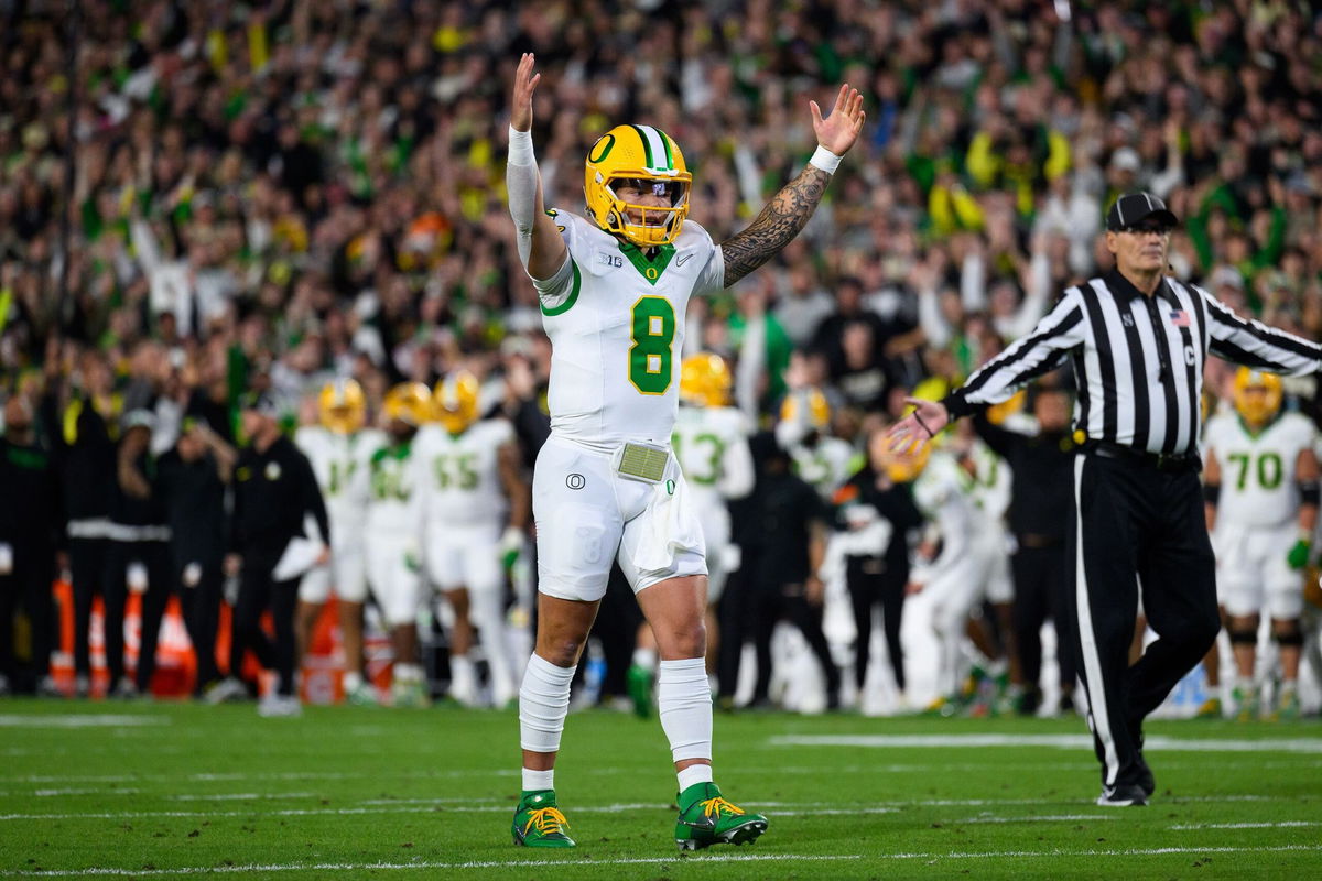 <i>Zach Bolinger/Icon Sportswire/Getty Images via CNN Newsource</i><br/>Oregon Ducks quarterback Dillon Gabriel celebrates against the Purdue Boilermakers.