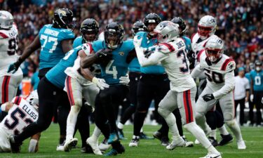 Jacksonville Jaguars running back Tank Bigsby rushes for his first touchdown against the New England Patriots.