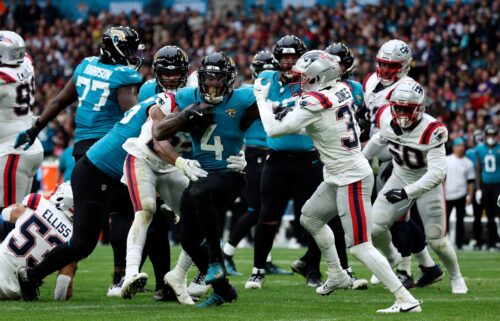 Jacksonville Jaguars running back Tank Bigsby rushes for his first touchdown against the New England Patriots.