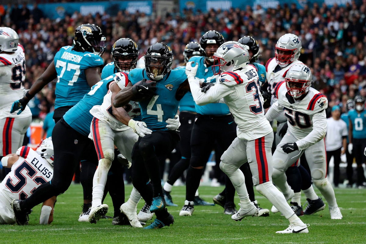 <i>Ian Walton/AP via CNN Newsource</i><br/>Jacksonville Jaguars running back Tank Bigsby rushes for his first touchdown against the New England Patriots.