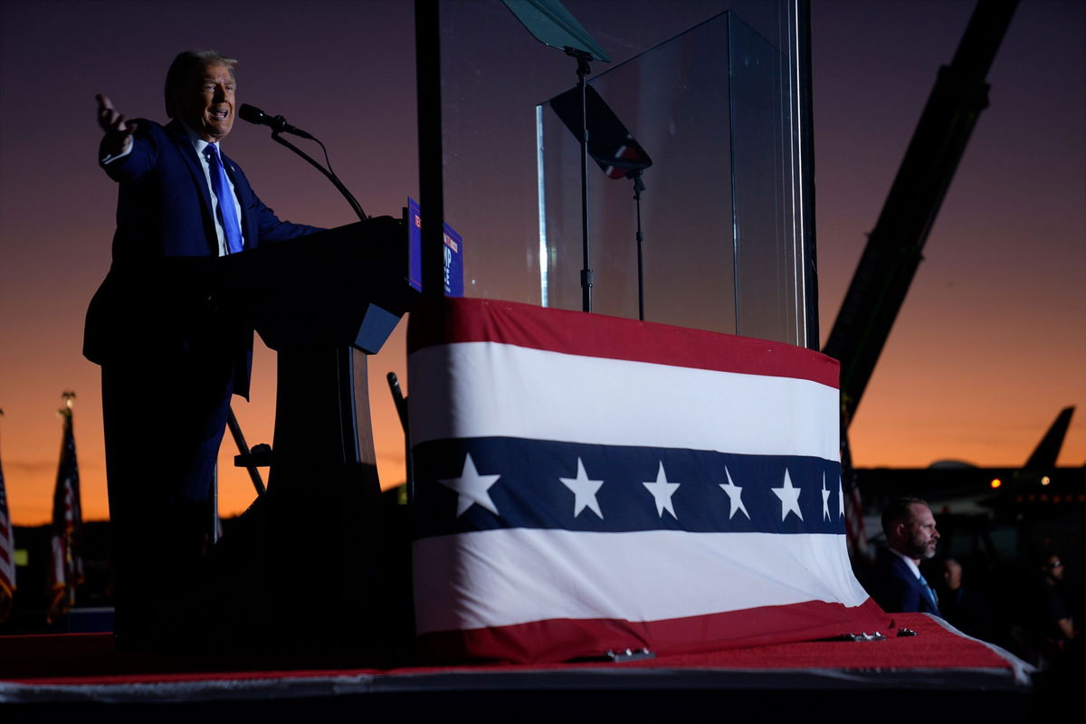 <i>Evan Vucci/AP via CNN Newsource</i><br/>Former President Donald Trump speaks during a campaign rally at Arnold Palmer Regional Airport