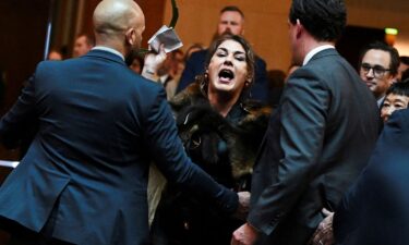 Australian Senator Lidia Thorpe stages a protest as Britain's King Charles and Queen Camilla attend a Parliamentary reception in Canberra