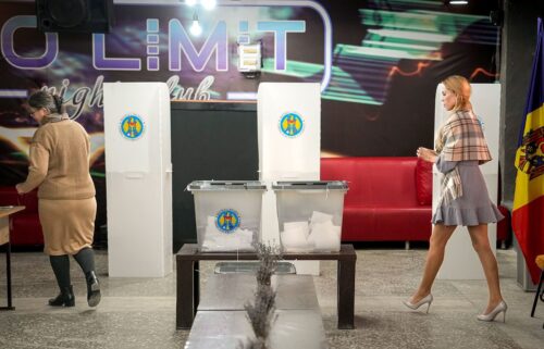 Moldovans cast their ballots at a polling station in Hrusevo on October 20.