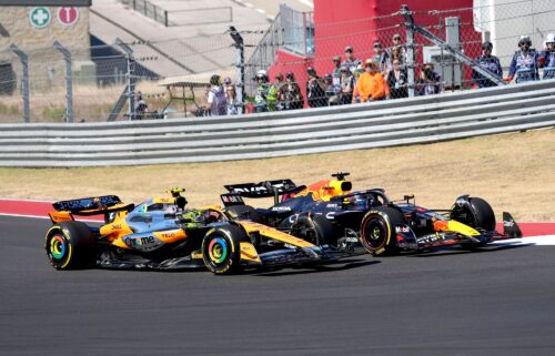 Norris (left) and Verstappen race through a turn during the US Grand Prix.