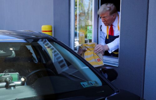 Former President Donald Trump serves food at a McDonalds restaurant in Pennsylvania.