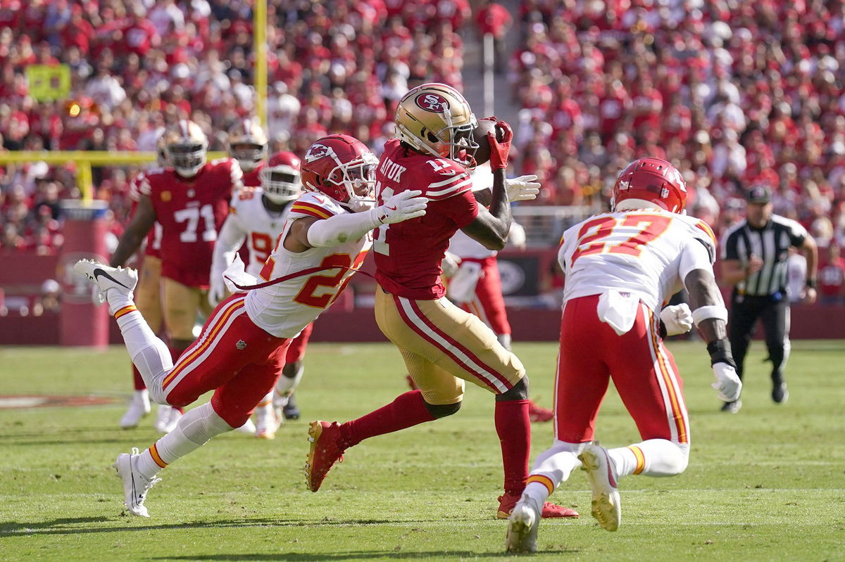 <i>Cary Edmondson/USA TODAY Sports/Reuters via CNN Newsource</i><br/>Aiyuk catches a pass between two Chiefs defenders during the game.