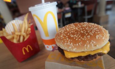 A Quarter Pounder hamburger is served at a McDonald's restaurant.